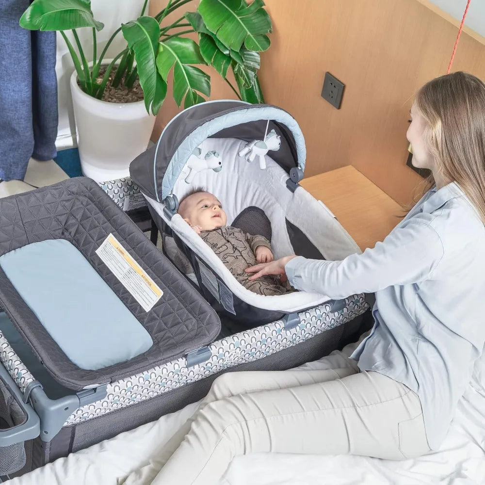 5 in 1 Multifunctional Pack and Play,Foldable Baby Crib with Bassinets,Changing Table,Newborn Napper with Canopy,Diaper Stacker