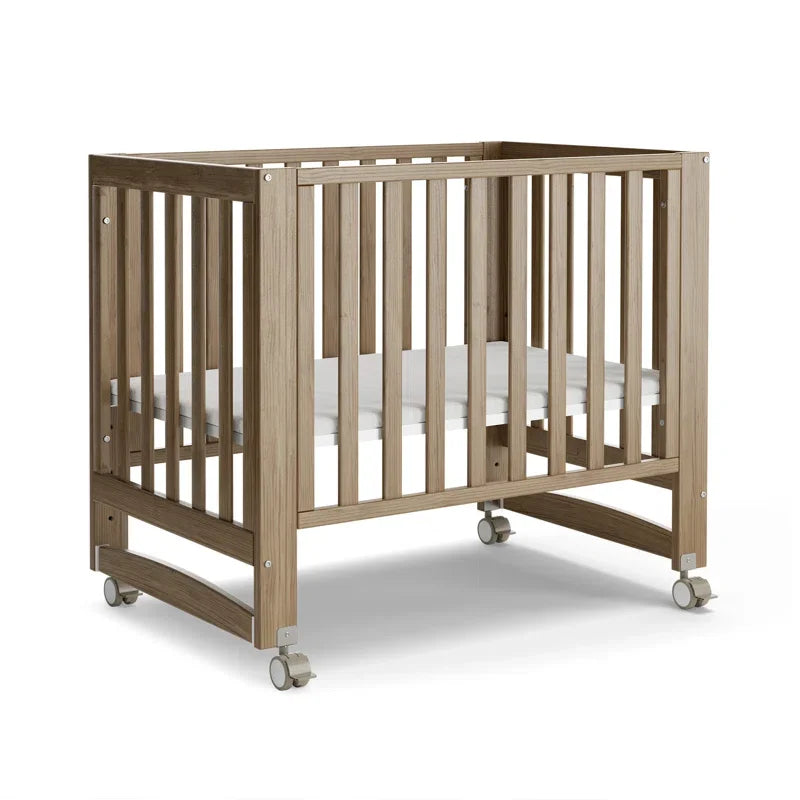 EvoNest 6-in-1 Portable Convertible Cradle to Mini Crib With Removable Wheels and Mattress, 4 Adjustable Mattress Height,