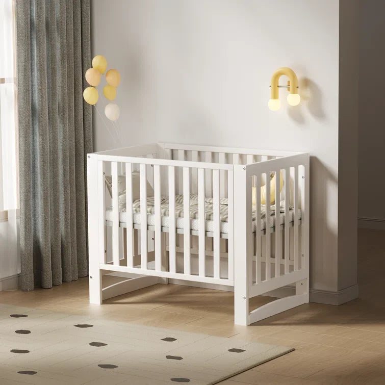 EvoNest 6-in-1 Portable Mini Crib with Mattress & 4 Height Adjustable, New Zealand Pinewood, White, MAMAZING